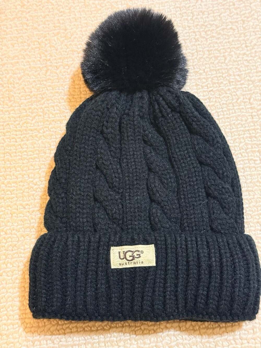 UGG Australia Black Cable Knit Beanie with Faux Fur Pom Pom